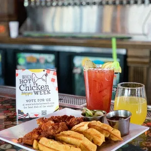 Celebrate Nashville&apos;s Hot Chicken week with our Hot Chicken &amp; Waffles. Pairs nicely with our 2 for 1 Mimosa and Bloody Mary special!