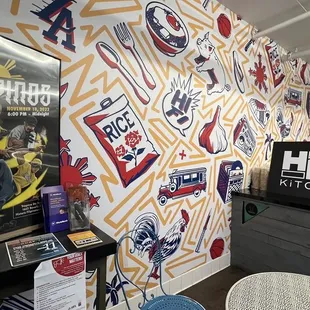 a wall with a variety of stickers on it