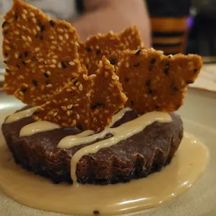 Chocolate Tahini Tart- caramel crème anglaise, sesame tuille - the best thing we had - really great