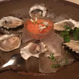Select Pacific oysters on the half shell