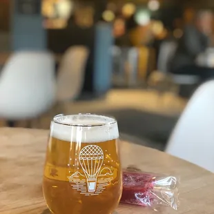 a glass of beer on a table
