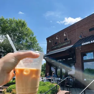 Iced vanilla latte + the front of the shop