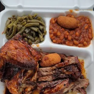 Beef brisket, white smoked chicken, string beans, and baked beans