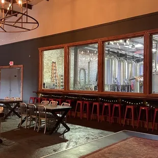 Back room with window into brew space