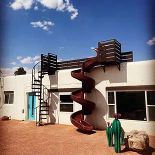 Custom roof deck, stairs, and slide!