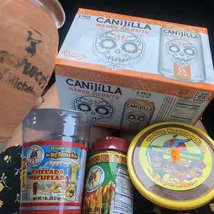 a can of cantilla, a jar of cantilla, a can of cantilla, and a