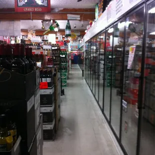 To the left of beer cooler 32.