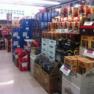 All of the gift sets that sell for 20.00 includes .750 size bottles and usually a set of glasses for whatever the beverage is.