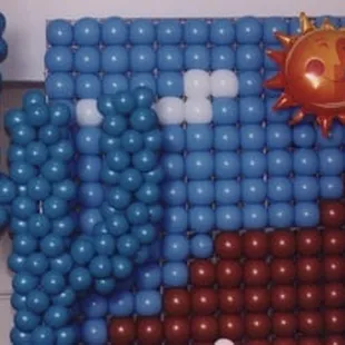 High Expectations themed balloon wall