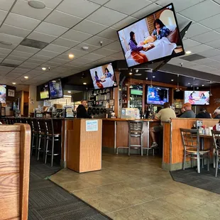 customers sitting at the bar