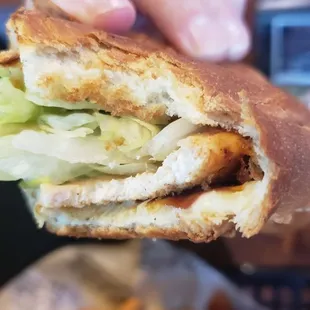Paper thin slice of chicken on $12.50 sandwich