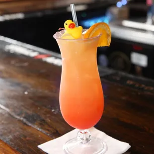 a cocktail with a rubber duck