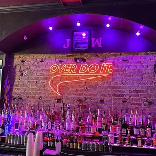 a bar with a neon sign