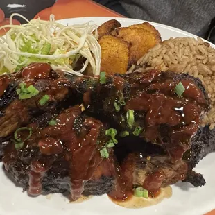 Jerk Chicken. Not used to seeing with this bbq style sauce but ohhhhh so good. Almost wanted more than oxtail.