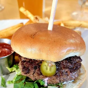 Fresh Hand-pattied burger stuffed with Goat Cheese, Blueberry Compote, Herb Aioli, House Pickled Jalapeños, and Romaine