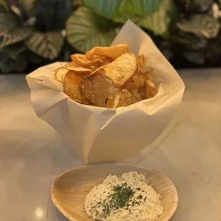 House-made Chips w/lemon marinaded artichoke dip