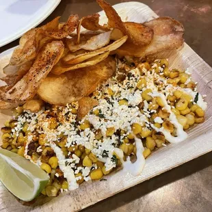 Elote corn dip with house made chips.