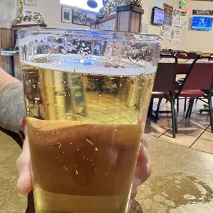 A beer in a dirty glass.