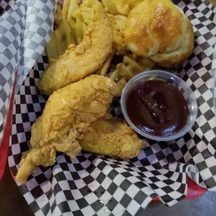 Chicken strips and fries with biscuit