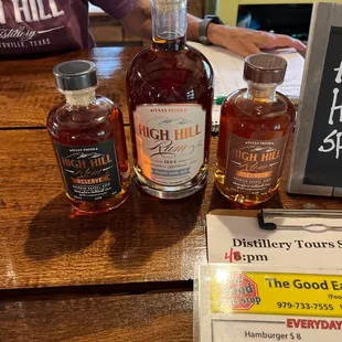 bottles of whiskey and a menu