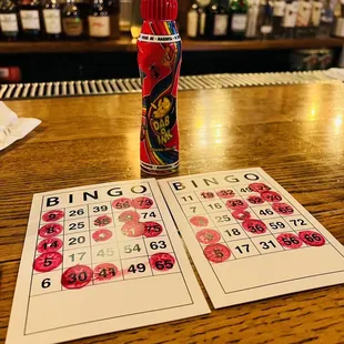 bingo cards on a bar table