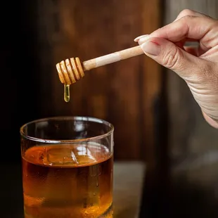 Beeswax-infused bourbon cocktail