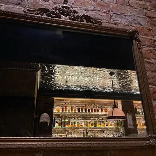 a reflection of a bar in a mirror