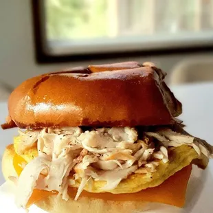 Turkey, egg, and cheese sammie on a buttered, toasted brioche bun, $4.95