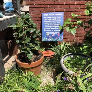 a sign in a garden