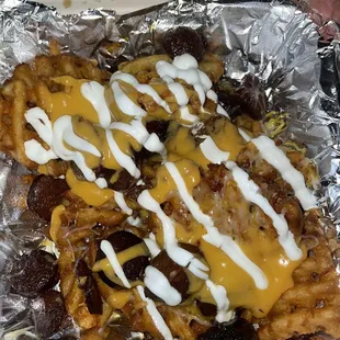 Not worth the hype burnt sausage very little cheese and sour cream. 4/10