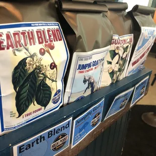 a display of earth blend coffee bags