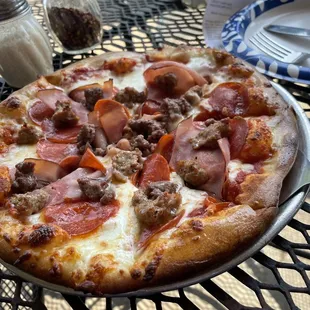 Four Meat Pizza. Delicious. Perfect crust man. I forgot, bout to be a regular.