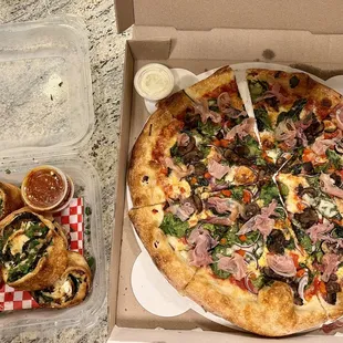 a pizza in a pizza box