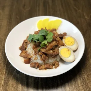 Braised pork belly rice "Lu Rou Fan".  It is served over rice and with a braised egg.