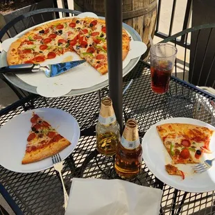 This is their Supreme Pizza. Simple and very delicious! And yes, they serve adult beverages!