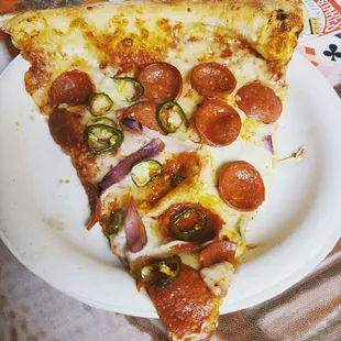 a slice of pepperoni pizza