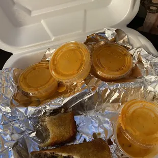 Cheesesteak Egg Rolls-2 orders strategically crammed n2 tha container. ‍4got 2 snap a pic b4 eating