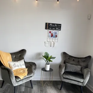 two chairs in a white room