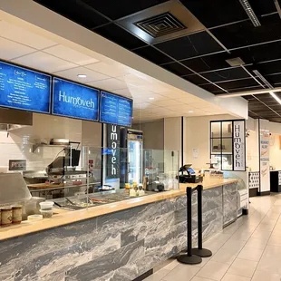 a restaurant counter with menus