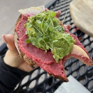 Micro greens, avocado smash, watermelon radish, beet hummus all on whole grain sourdough yum!