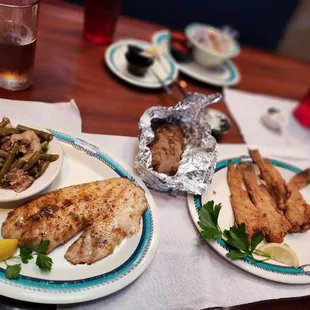 three plates of food on a table