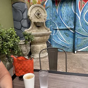 Back patio is a great spot to eat. It is protected from the wind and nicely decorated.