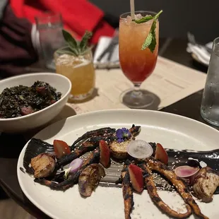 a plate of grilled vegetables and a drink