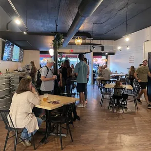 people eating and drinking in a restaurant