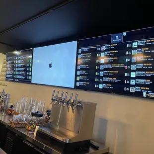 a man standing in front of a bar