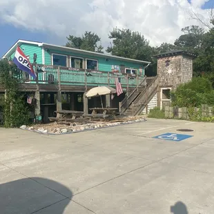 a blue building with a green exterior