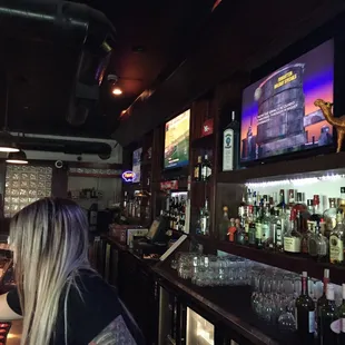 a woman sitting at the bar