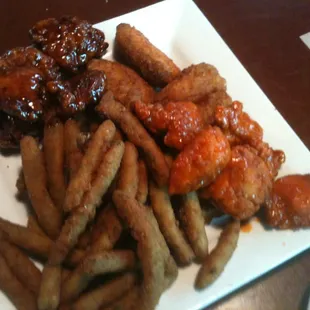 Appetizer sampler: fried green beans, boneless Buffalo chicken, teriyaki chicken drumettes, and jalapeño poppers
