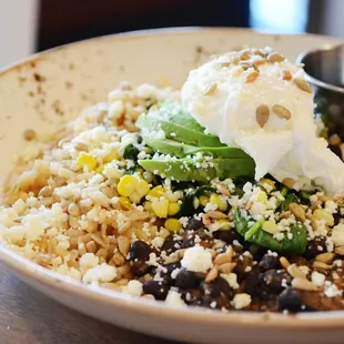 a bowl of food with a scoop of ice cream