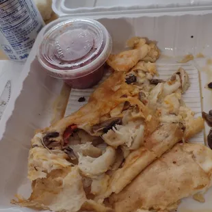 Undercooked. Middle was doughy. Mainly ate the toppings inside. Who taught them how to cook these. I've had them better from years before.